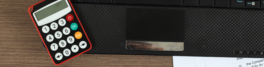 calculator and laptop banking