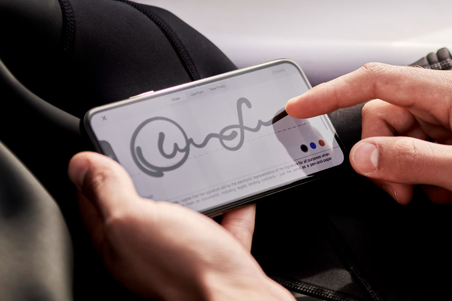 businessman with digital signature on tablet